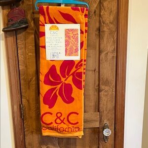 C&C California Bright Orange Towel with Pink Floral Design